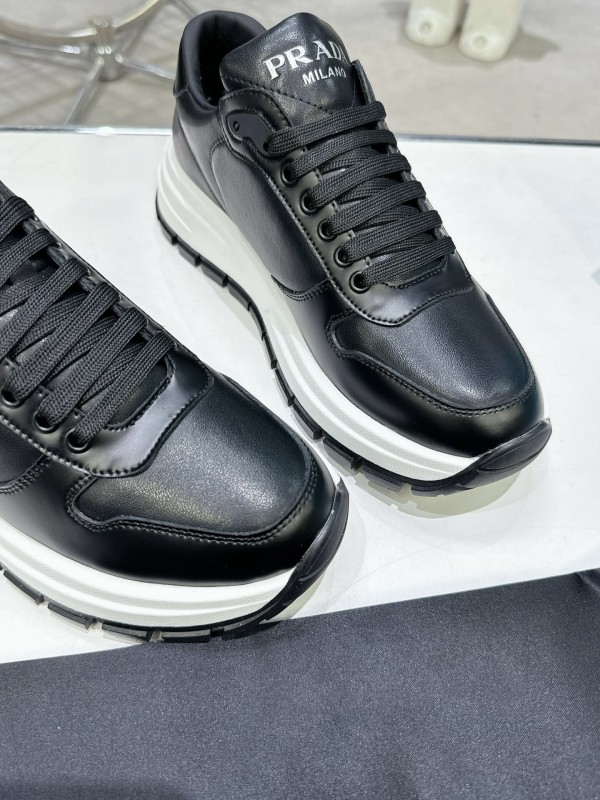 2025 Unisex Prada Black Leather Sneakers KFY00310